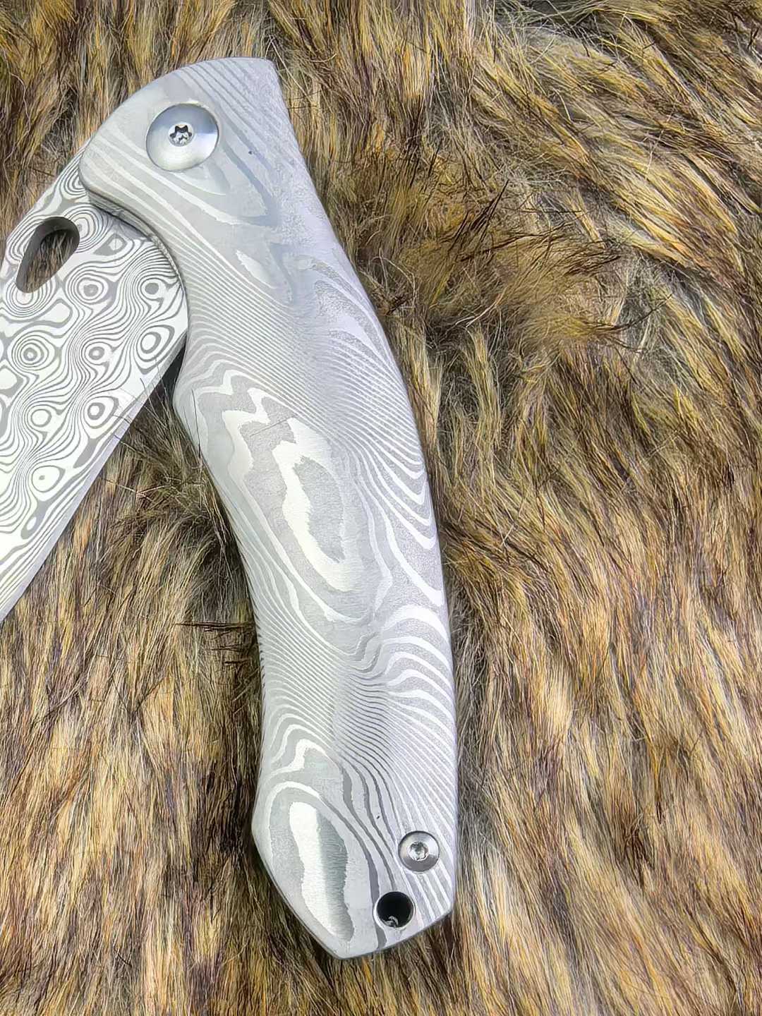 Titanium Rose Pattern Folding Knife Intricately Carved Spine Meticulously Polished Handle Combination