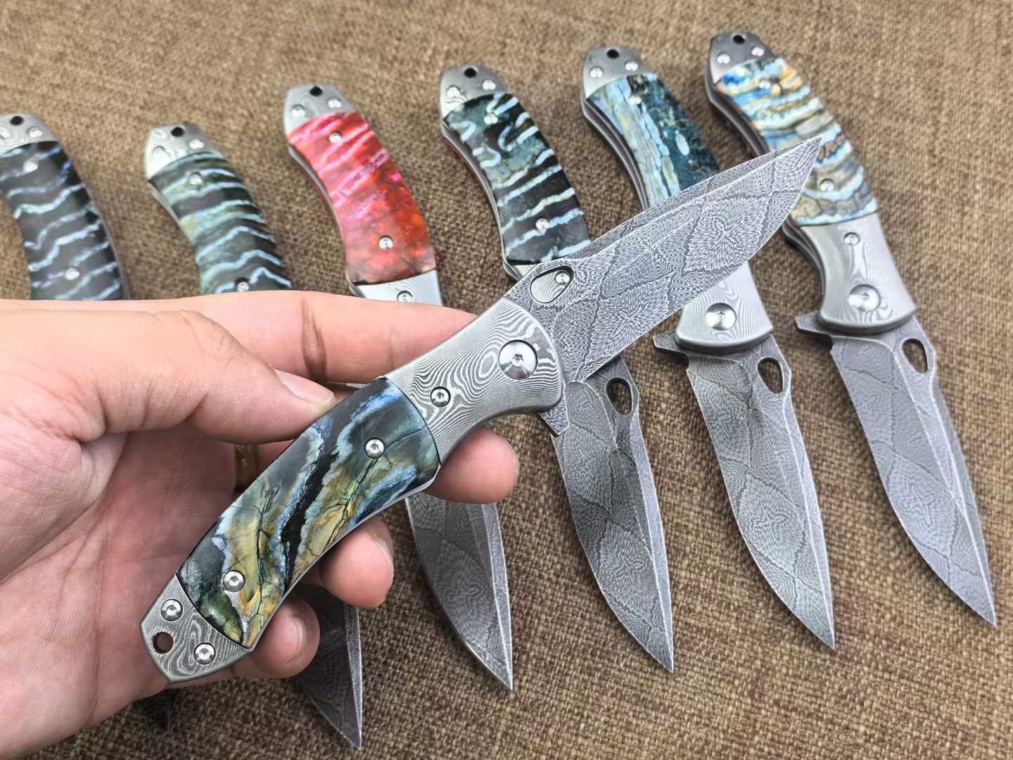 Swedish Steel Forged with Sakura pattern Handle Combination Made from Hardened and Finely Ground Mammoth Teeth from Approximately 5000 Years Ago Hand-Stitched Leather Sheath