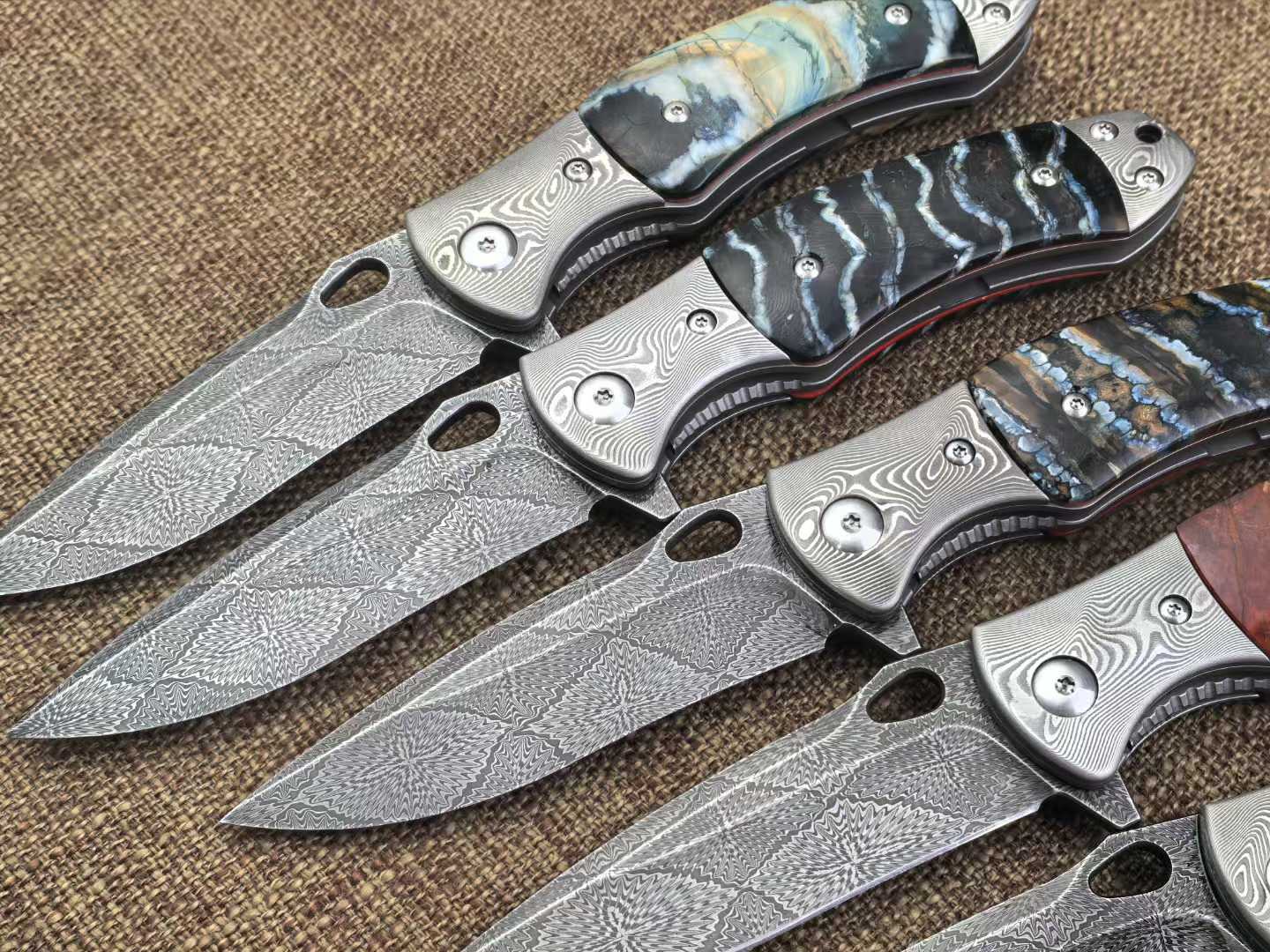 Swedish Steel Forged with Sakura pattern Handle Combination Made from Hardened and Finely Ground Mammoth Teeth from Approximately 5000 Years Ago Hand-Stitched Leather Sheath