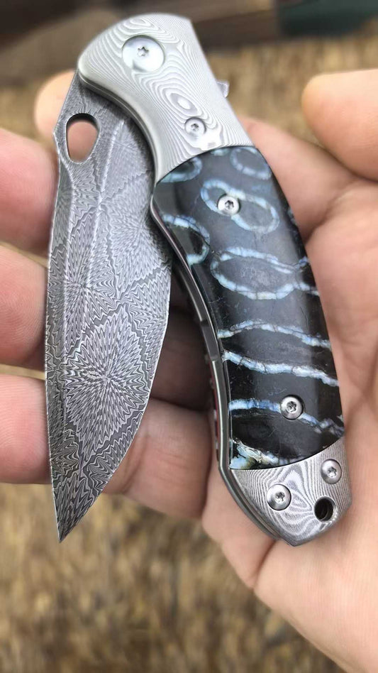 Swedish Steel Forged with Sakura pattern Handle Combination Made from Hardened and Finely Ground Mammoth Teeth from Approximately 5000 Years Ago Hand-Stitched Leather Sheath